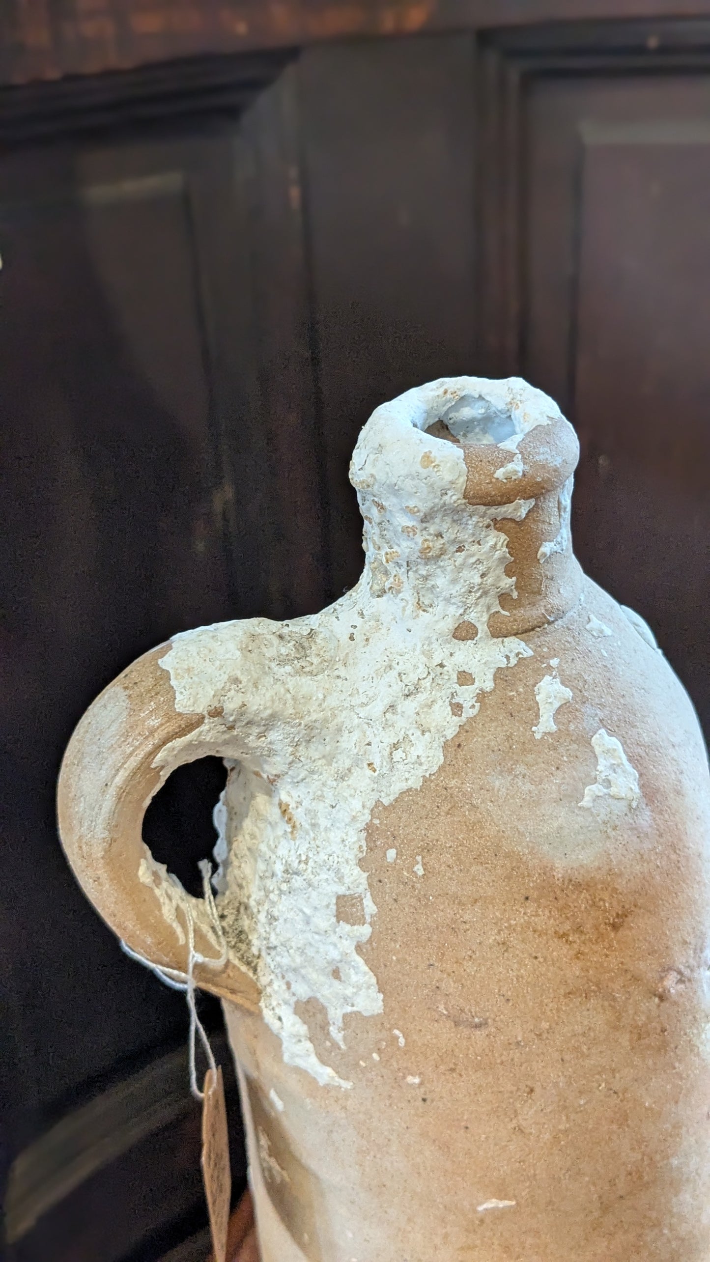 Antique Clay Bottle with Coral