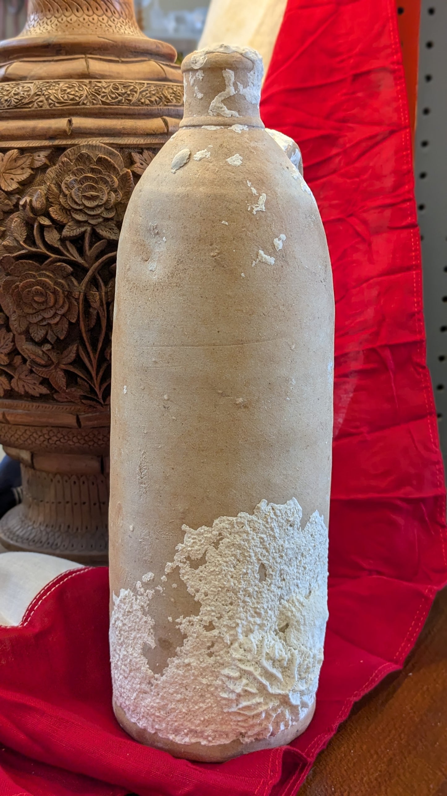 Antique Clay Bottle with Coral