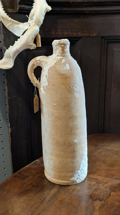 Antique Clay Bottle with Coral