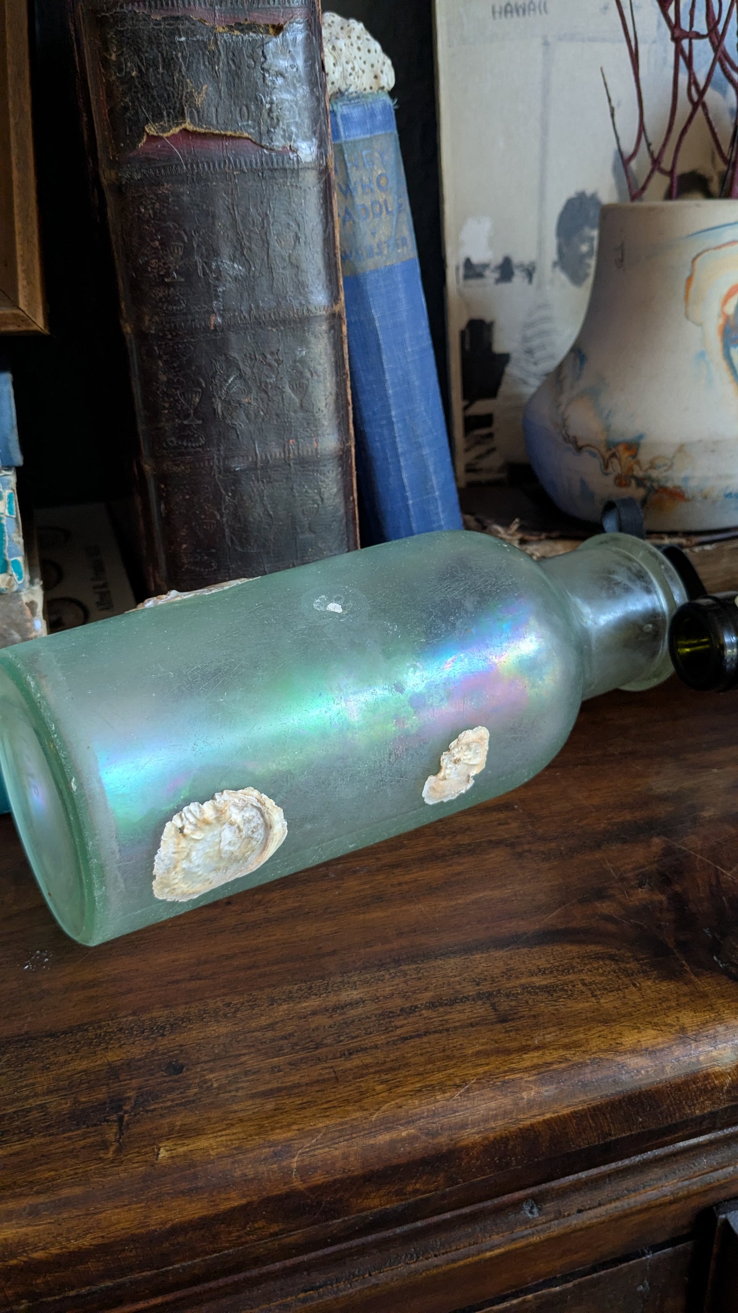 Antique Bottle with Barnacle Deposits