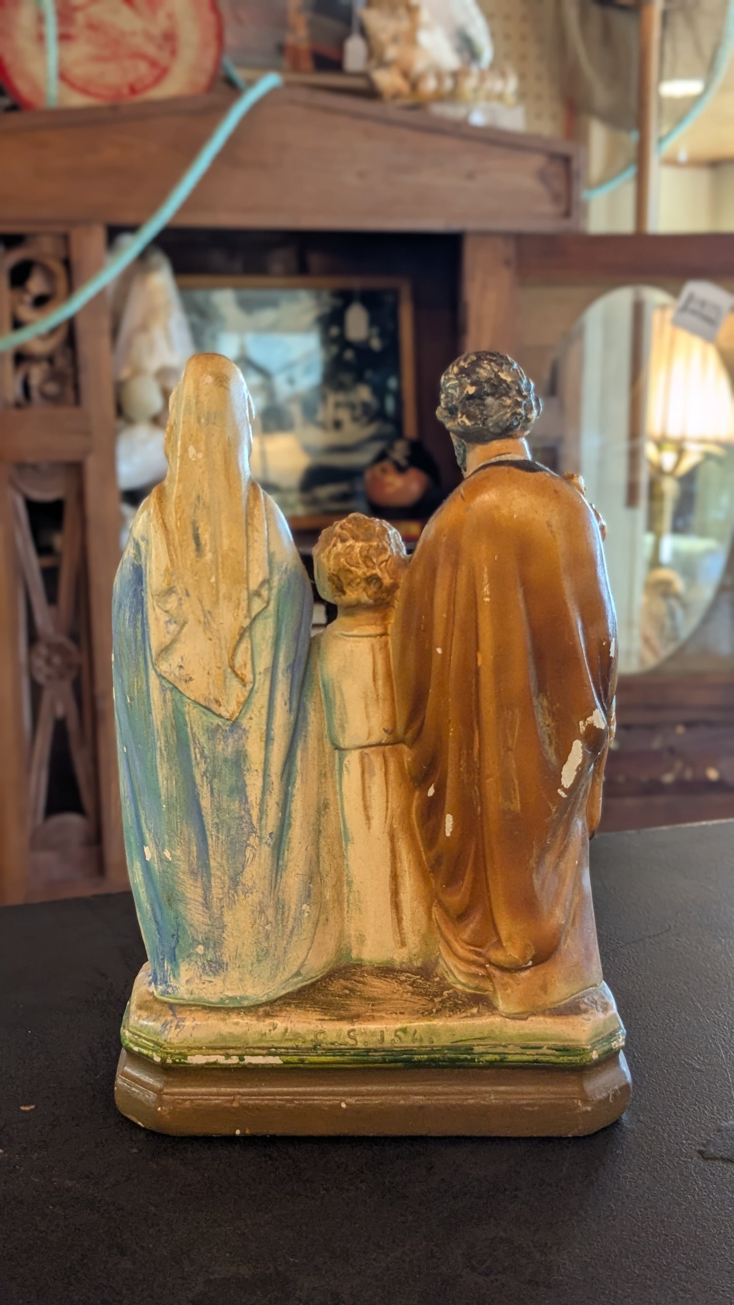 Antique chalkware statue of the Holy Family