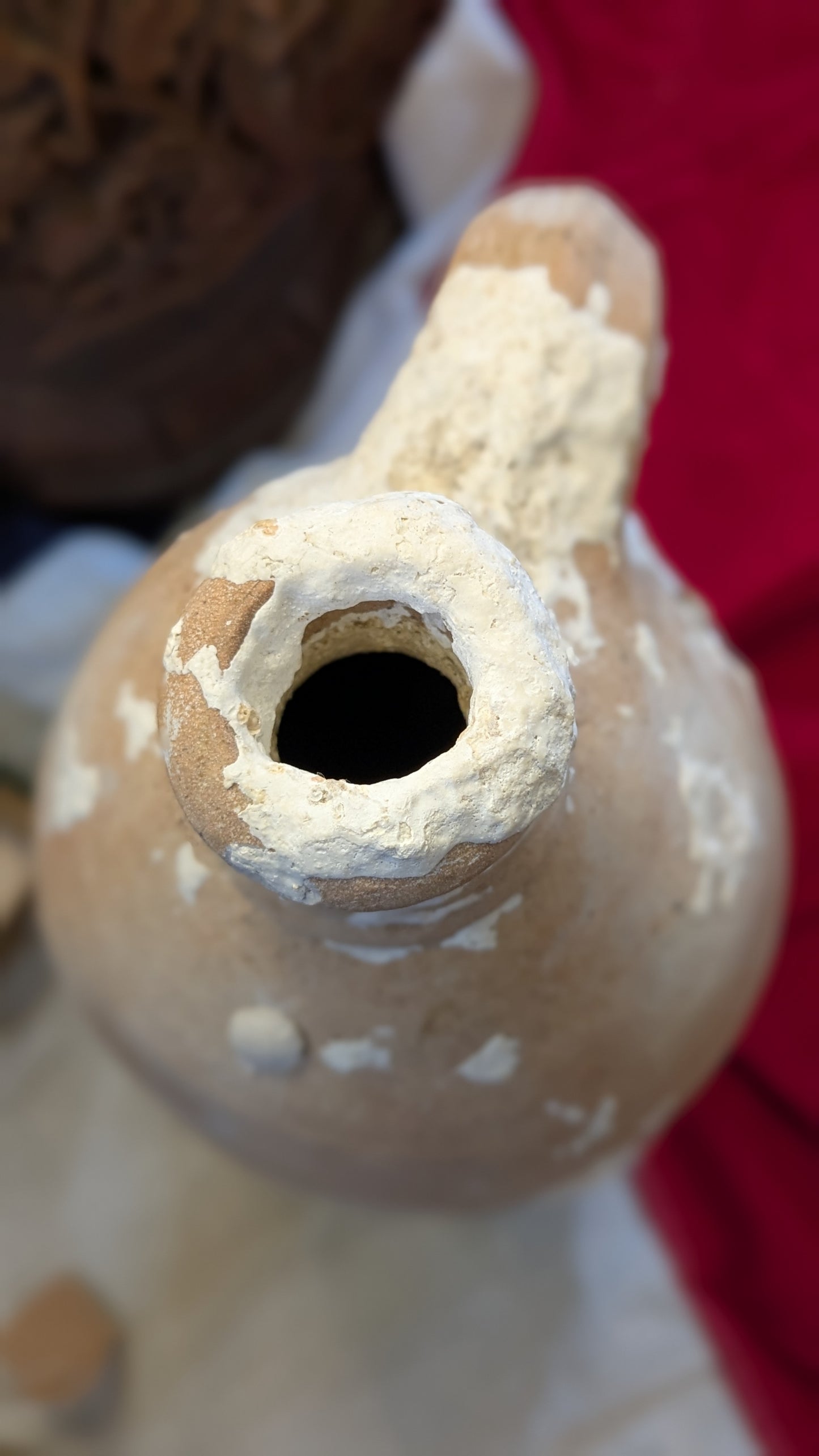Antique Clay Bottle with Coral