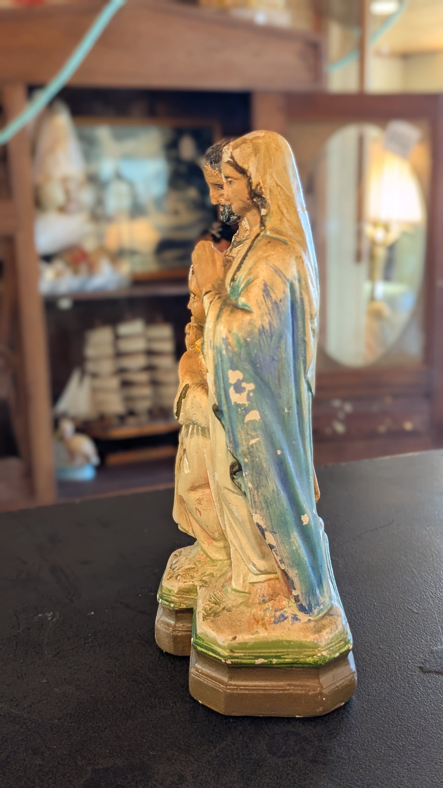 Antique chalkware statue of the Holy Family
