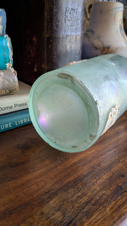 Antique Bottle with Barnacle Deposits