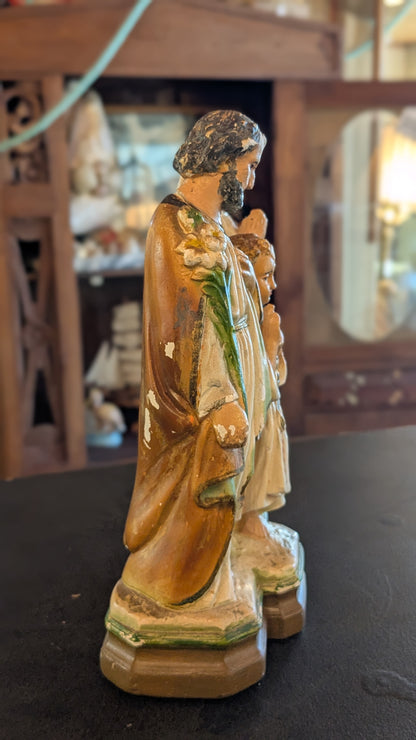 Antique chalkware statue of the Holy Family