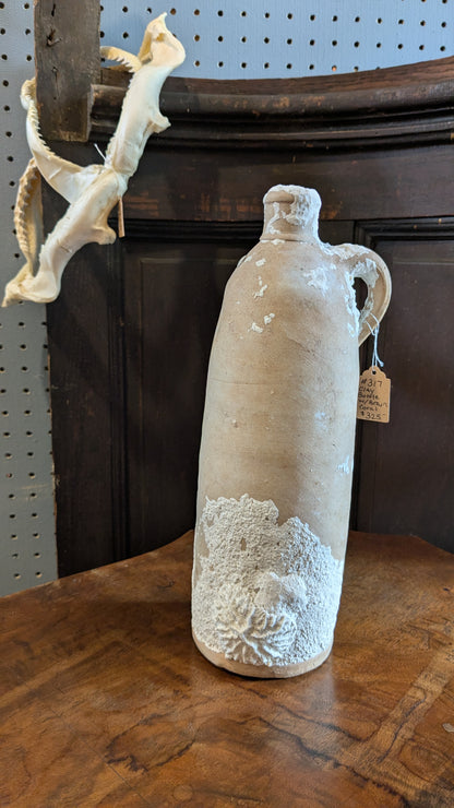 Antique Clay Bottle with Coral