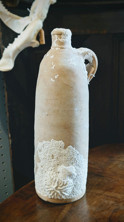 Antique Clay Bottle with Coral