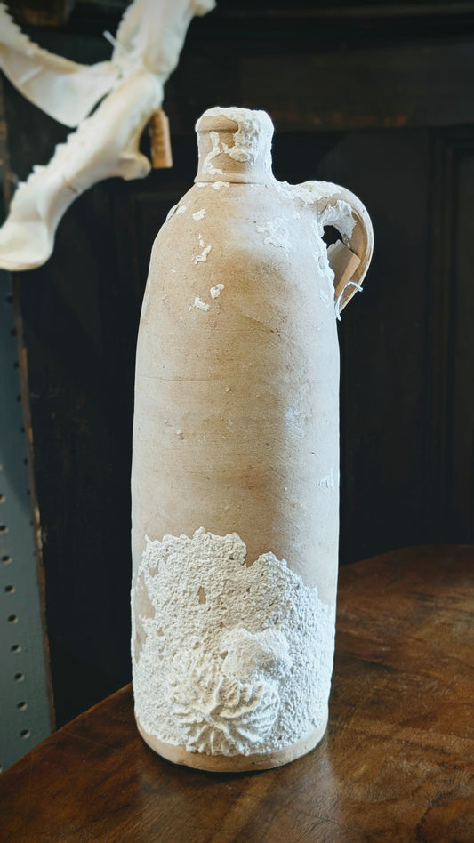 Antique Clay Bottle with Coral