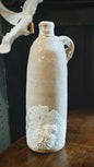 Antique Clay Bottle with Coral