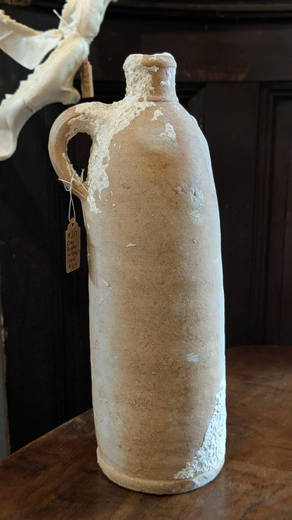 Antique Clay Bottle with Coral